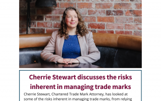 Cherrie Stewart, Chartered Trade Mark Attorney, sits at a table in front of a brick wall. In the article she discusses the risks of trade marks