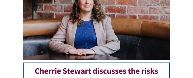 Cherrie Stewart, Chartered Trade Mark Attorney, sits at a table in front of a brick wall. In the article she discusses the risks of trade marks